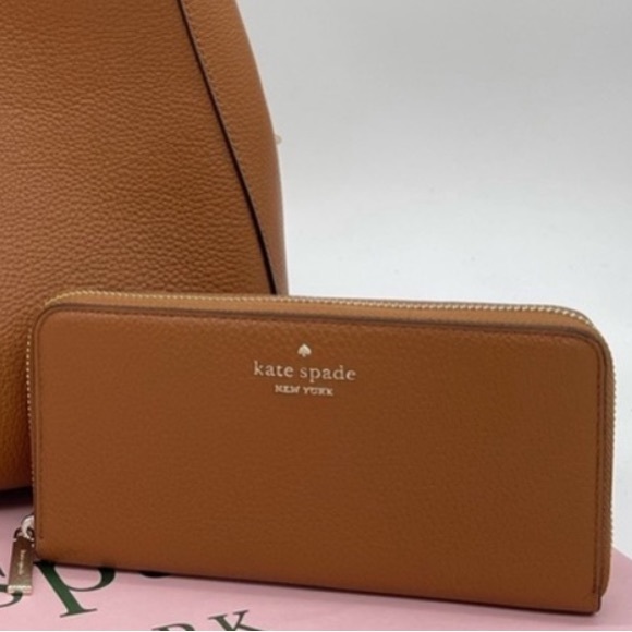 kate spade Handbags - kate spade tan leather zip-around wallet